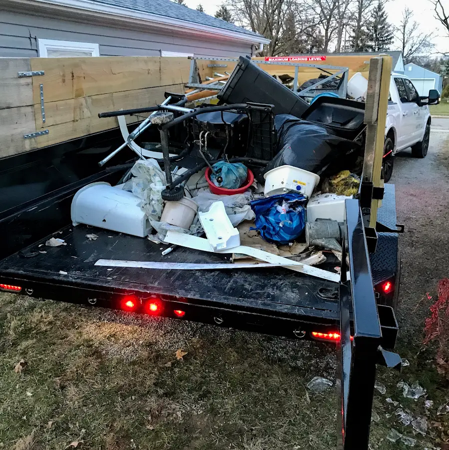 Roll-off dumpster delivered to a residential driveway in Cache